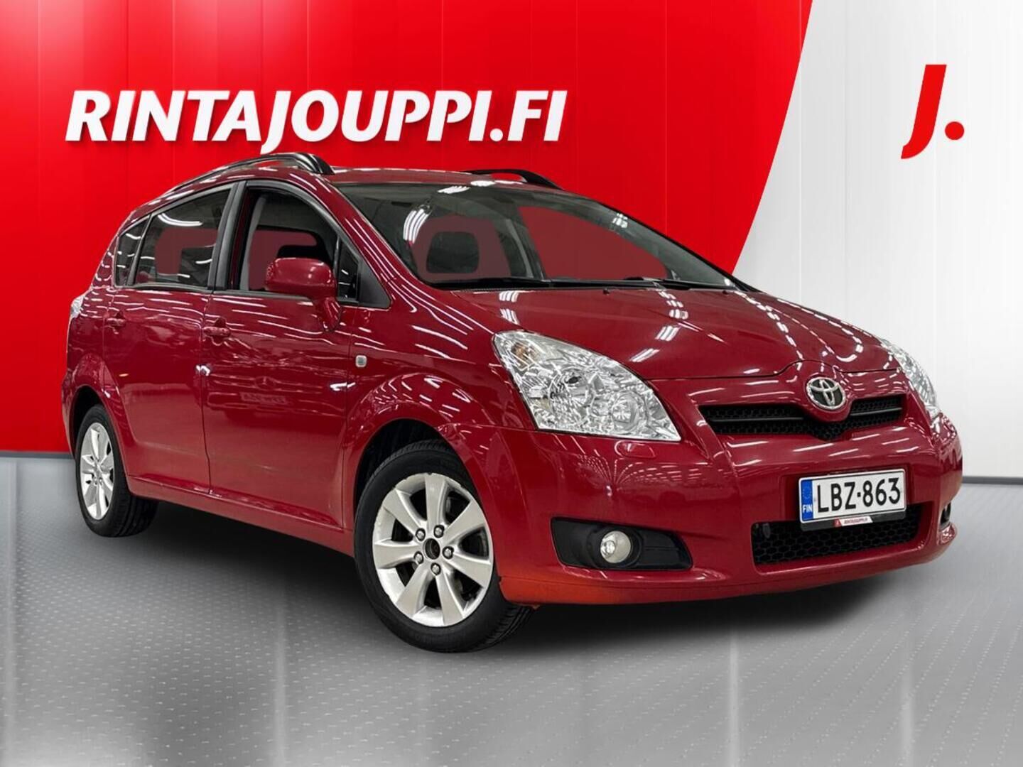 Punainen Toyota Corolla Verso